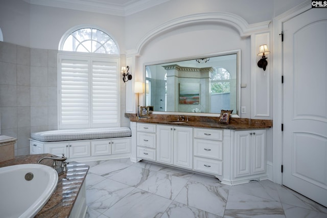 bathroom featuring tile walls, vanity, a tub to relax in, and crown molding