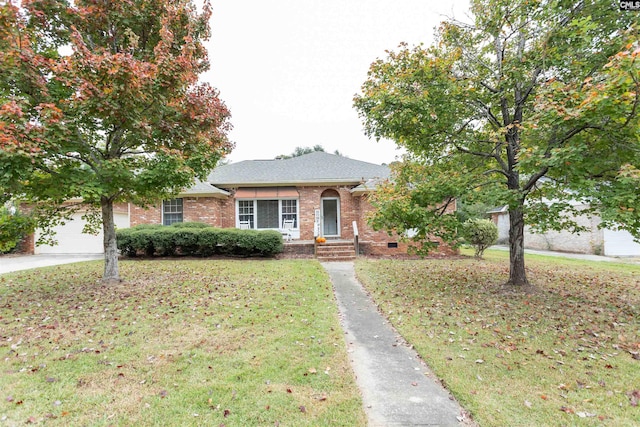 single story home with a garage and a front yard