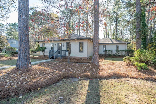 ranch-style house with a front yard