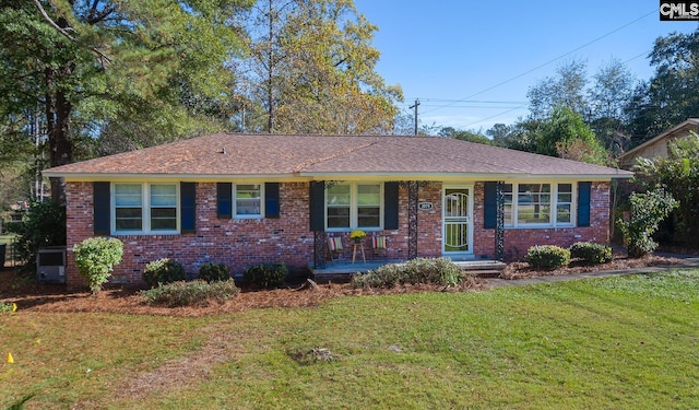 ranch-style house with a front lawn