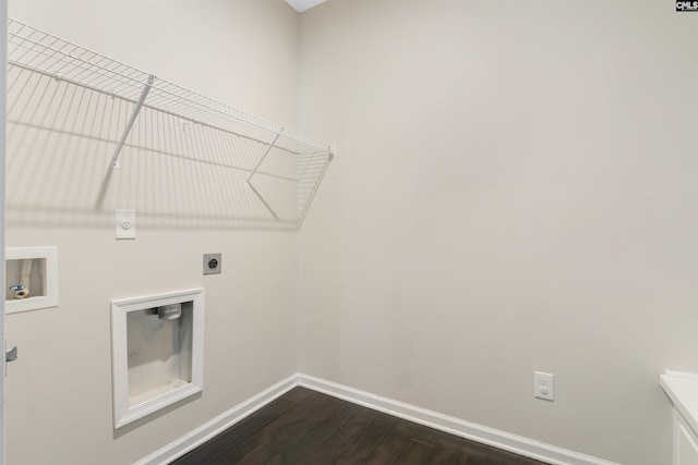 washroom featuring dark wood-type flooring, hookup for a washing machine, and electric dryer hookup