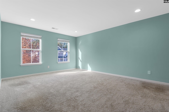 empty room featuring carpet floors