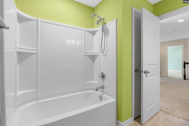 bathroom featuring tile patterned floors and bathtub / shower combination