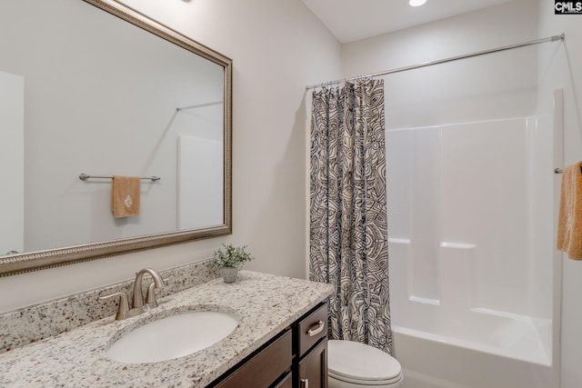 full bathroom featuring shower / bath combination with curtain, vanity, and toilet