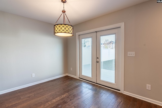 doorway to outside with french doors and dark hardwood / wood-style floors