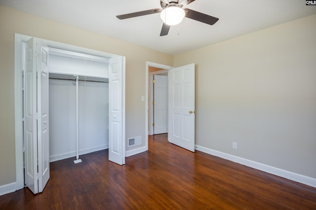 unfurnished bedroom featuring a closet, ceiling fan, and dark hardwood / wood-style floors