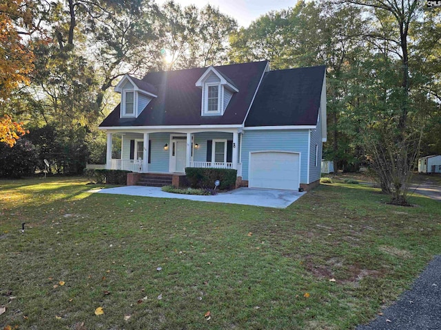 new england style home with covered porch, a front yard, and a garage