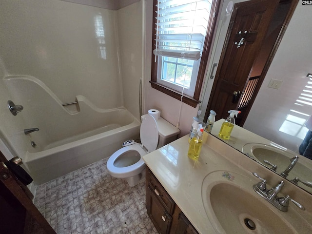 full bathroom with vanity,  shower combination, and toilet