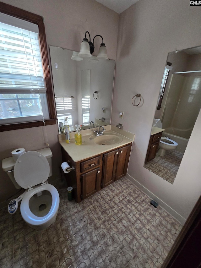 full bathroom with shower / tub combination, vanity, and toilet