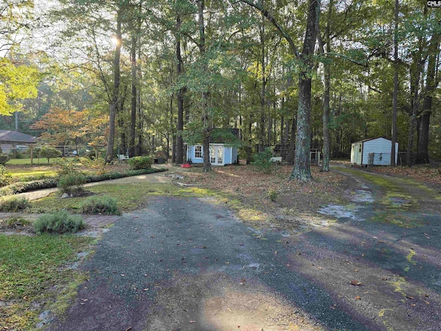 view of front facade with a shed