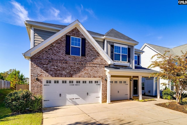 view of front of property with a garage