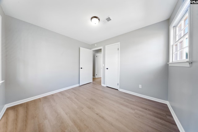 unfurnished bedroom with light hardwood / wood-style flooring