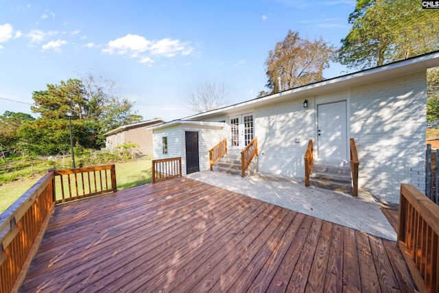 wooden deck featuring french doors