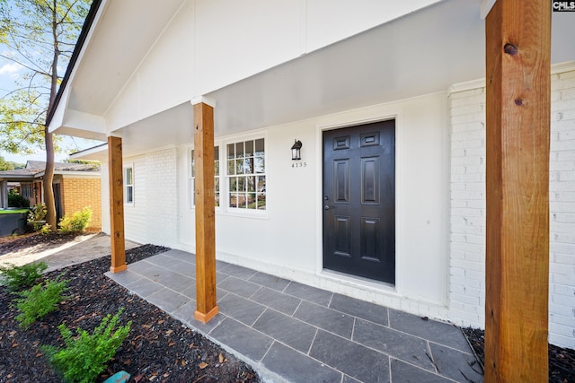 property entrance with a porch