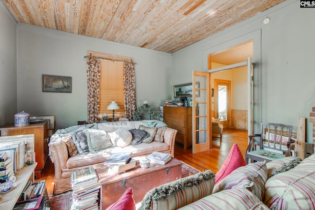 living room featuring wooden ceiling and light hardwood / wood-style flooring