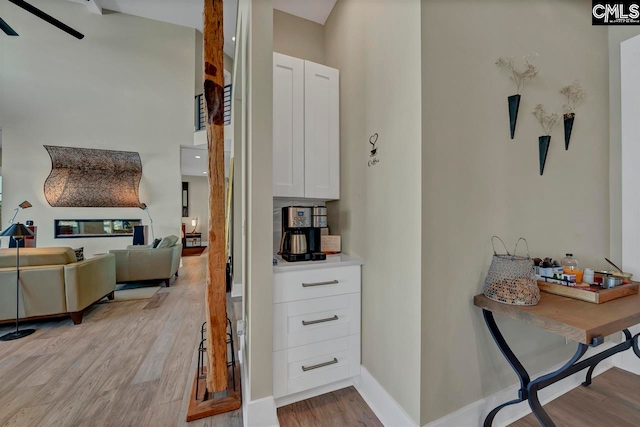 corridor featuring light hardwood / wood-style flooring