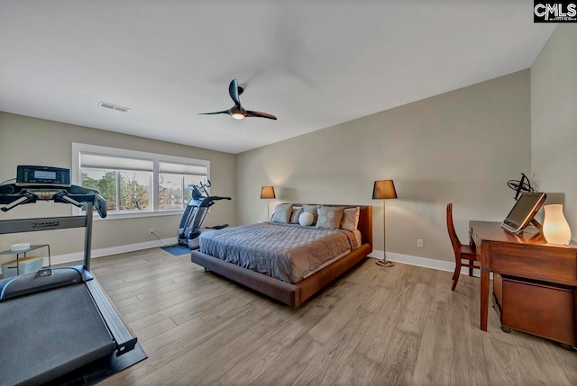 bedroom featuring ceiling fan and light wood-type flooring