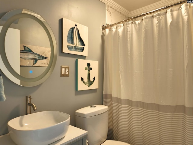 bathroom with curtained shower, crown molding, vanity, and toilet