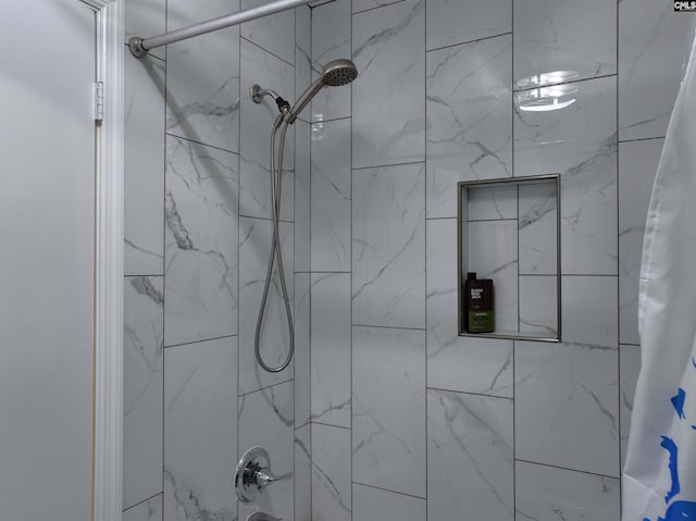 bathroom with shower / tub combo with curtain