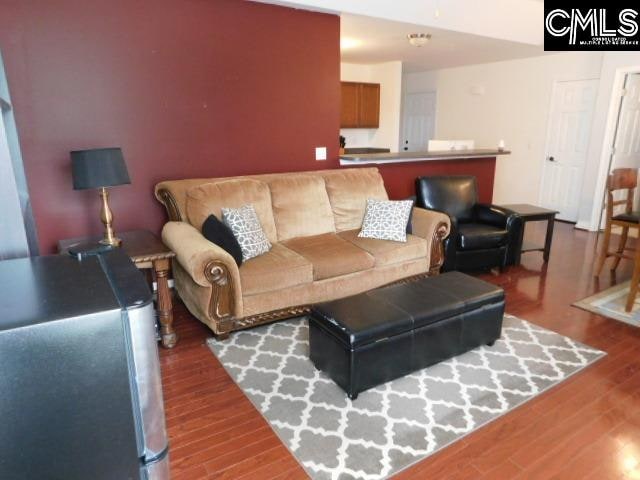 living room with wood-type flooring