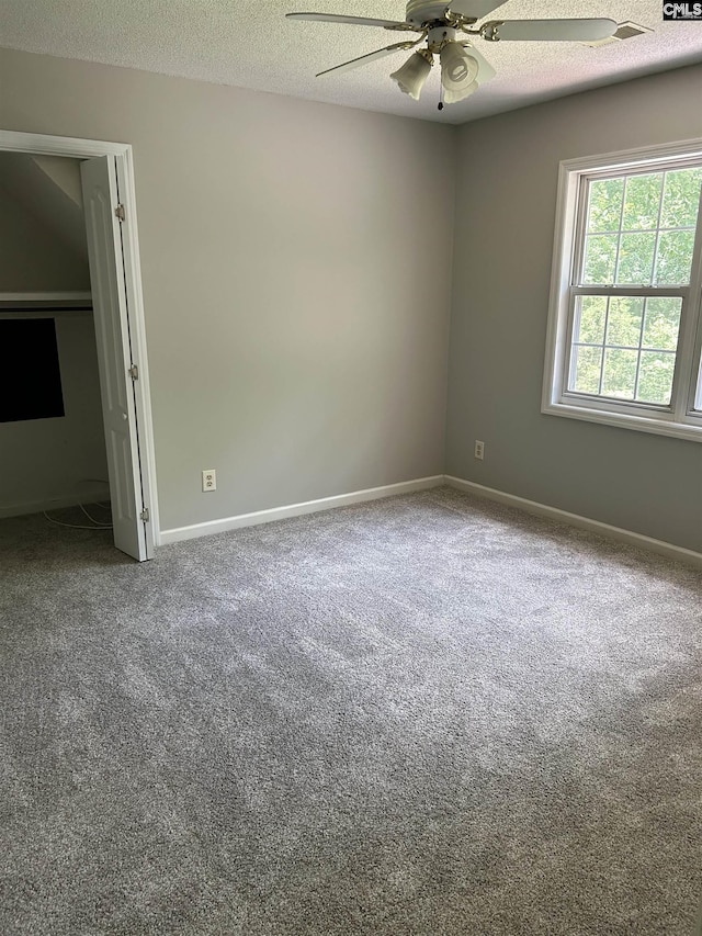 1110 Eleazer Rd, Irmo, SC 29063 - unfurnished bedroom with carpet, a textured ceiling, baseboards, and a ceiling fan