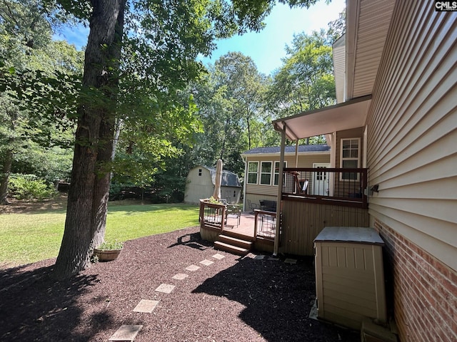 view of yard with a deck