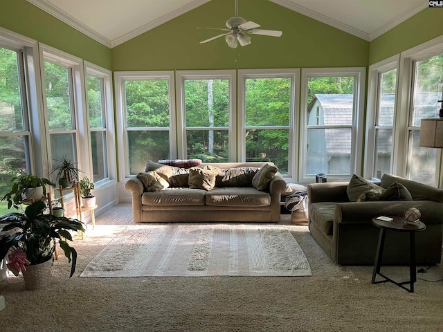 sunroom / solarium featuring ceiling fan and vaulted ceiling