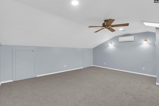 additional living space featuring carpet, ceiling fan, a wall unit AC, and vaulted ceiling