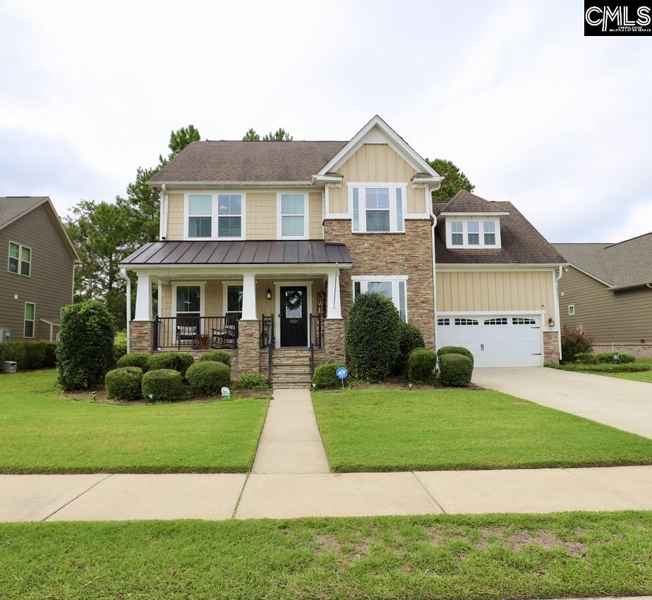 craftsman-style house featuring a porch and a front yard