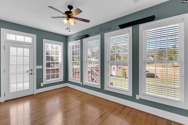 interior space featuring ceiling fan