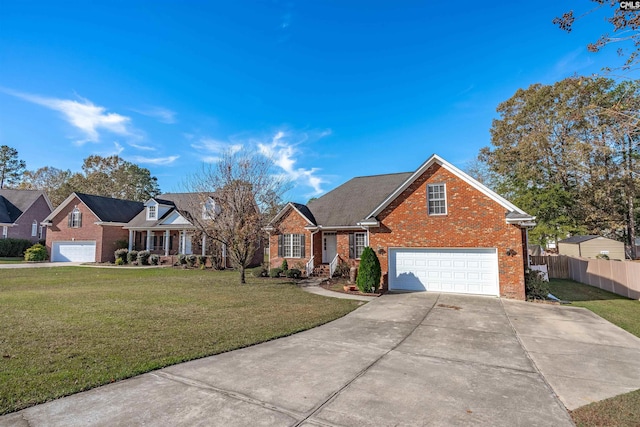 view of front facade with a garage and a front lawn