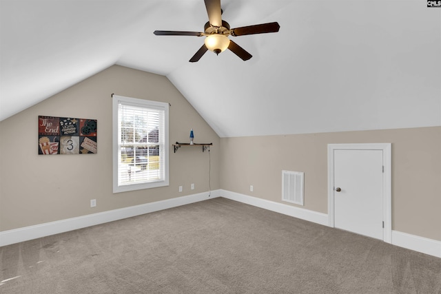 bonus room with carpet flooring, ceiling fan, and lofted ceiling