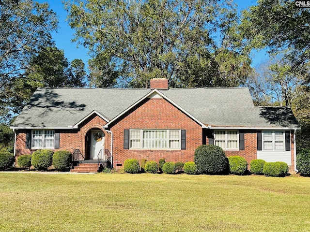 view of front of home with a front yard