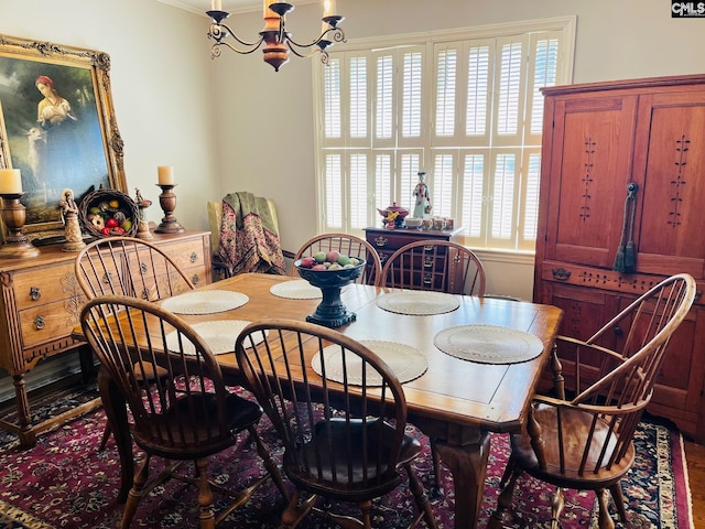 dining space featuring a chandelier