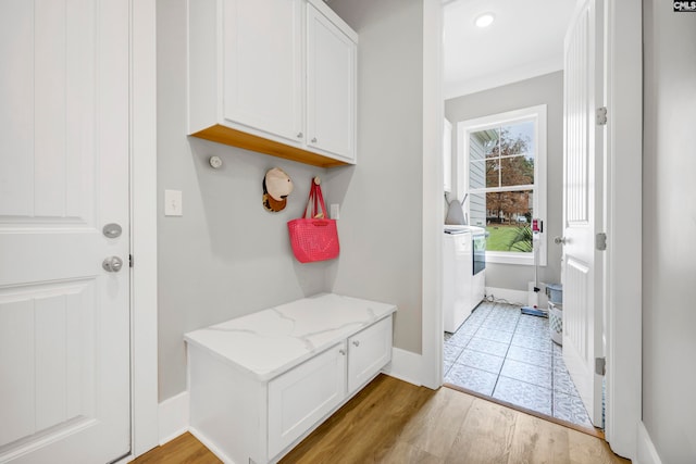 mudroom featuring light wood-type flooring