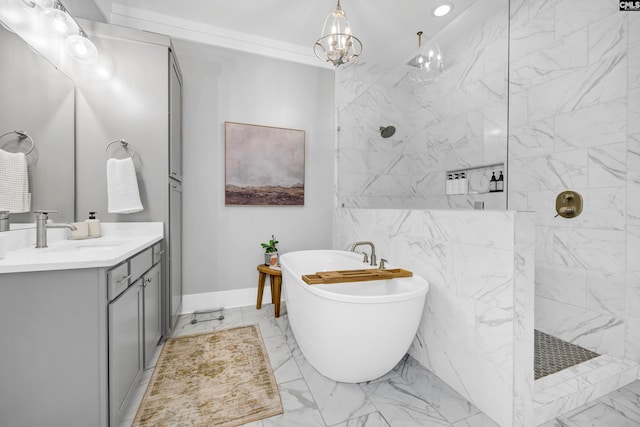 bathroom with vanity, independent shower and bath, and a notable chandelier