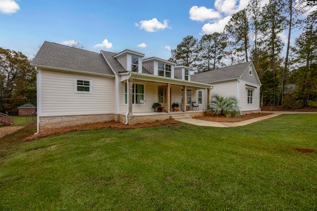 exterior space with a lawn and a porch