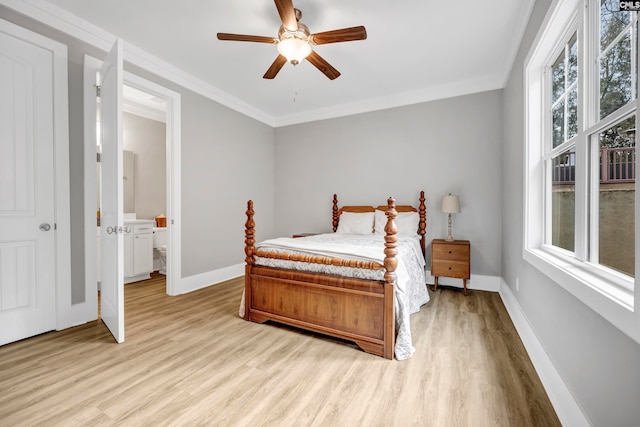 bedroom featuring light wood-type flooring, multiple windows, and ceiling fan