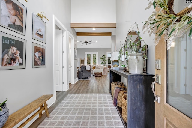 entryway with hardwood / wood-style floors and ceiling fan