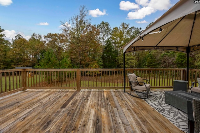 wooden deck with a gazebo