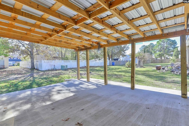 deck with a patio and a lawn