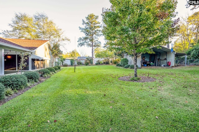 view of yard with a carport