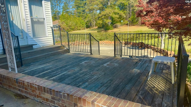 deck featuring a yard