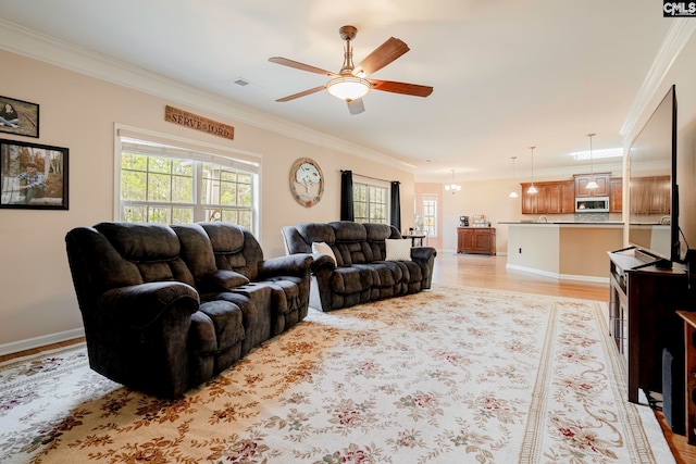 living room with ceiling fan, light hardwood / wood-style flooring, and ornamental molding