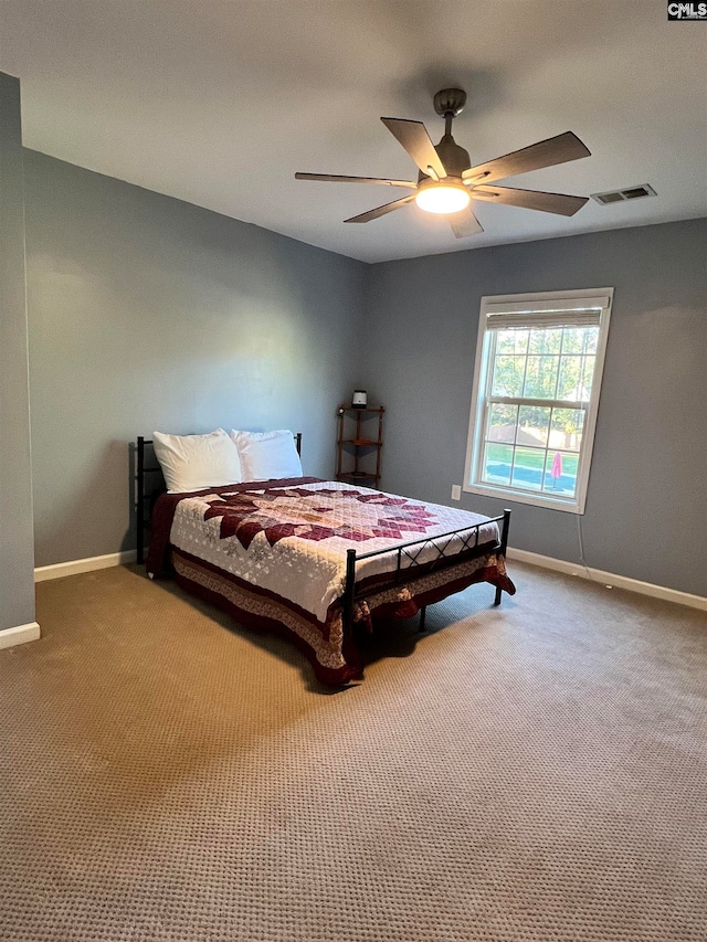 bedroom featuring carpet flooring and ceiling fan
