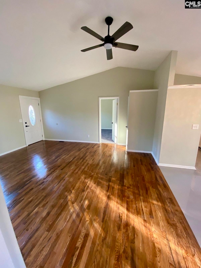 unfurnished living room featuring ceiling fan, lofted ceiling, and hardwood / wood-style flooring