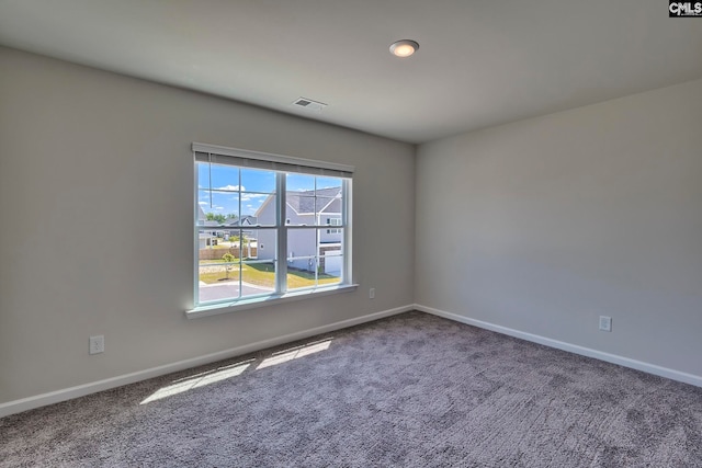 view of carpeted spare room