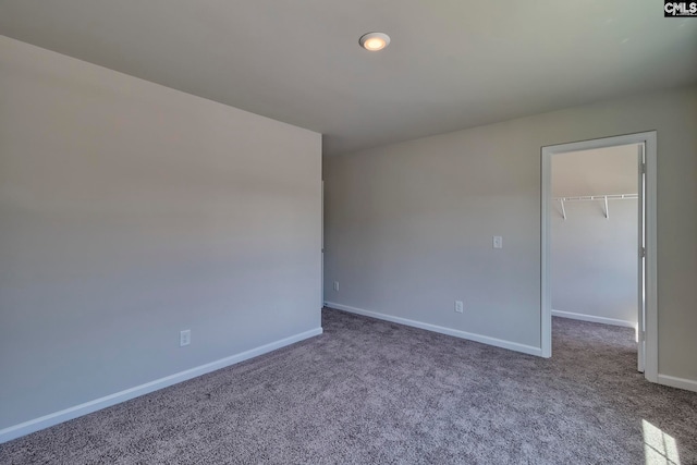 empty room featuring carpet flooring