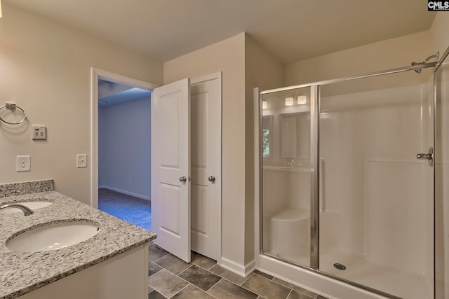 bathroom featuring vanity and walk in shower