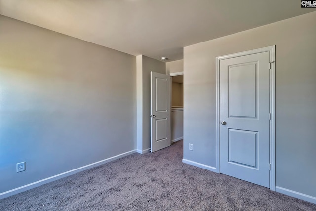 unfurnished bedroom with light carpet